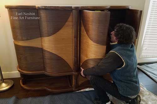 Earl installs retractable doors for custom made art deco liquor cabinet